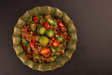 Beef Sisig is Filipino Food Served in a Plate. 