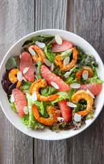 Salad with grapefruit, shrimps and almonds. Healthy eating. Diet.