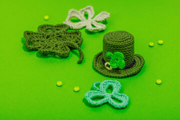 Handmade St. Patrick's Day concept. Traditional decorative symbols, pot with golden coins
