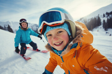 Fototapeta na wymiar Two young children enjoying skiing in snow