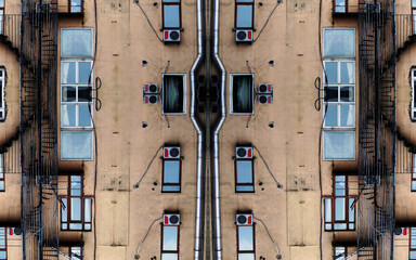 Urban Geometry. Abstract architectural design. Background Pattern. Architectural detail of building. Facade fragment of a building. Exterior of concrete wall with metal stairs and windows
