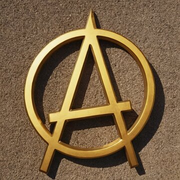 Symbol of Anarchy, against the background of the wall. Concept art, music covers, protests and activism.