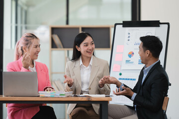 Professional team of business people planning and strategizing business plan together.