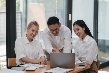 Fototapeta premium Businesspeople working together on new project in modern office. Teamwork concept.