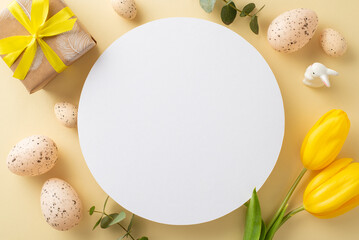 Easter-themed top view flat lay of gift box, tulips, bunny decor, eggs, and eucalyptus on soft beige background, empty circle suitable for holiday promotions or greetings