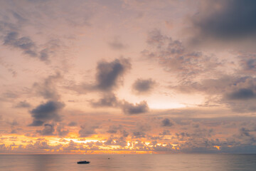 scene romantic sunset at Karon beach. abstract nature background..Sunset with bright color light rays and other atmospheric effects..Gradient color.cloudscape background in Phuket Thailand.