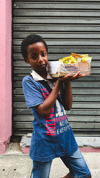 Brasil boy selling canddys