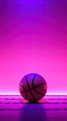 Obraz premium Basketball on purple neon background. Basketball isolated on neon glowing wall. vertical orientation