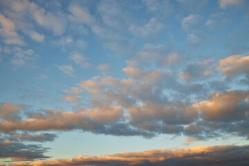 Naklejka na ściany i meble Cloudscape of cumulus sunset clouds