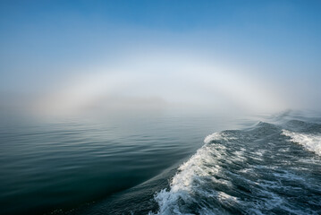Fogbow arch of fog over sea