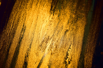 Golden Brush Artistic Texture. Abstract Grunge Decorative Background. Art Rough Stylized Texture Banner. Hand painted ink texture. Macro Shot