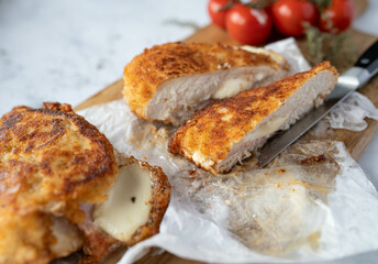 Filled chicken breast with mozzarella cheese and italian ham. 