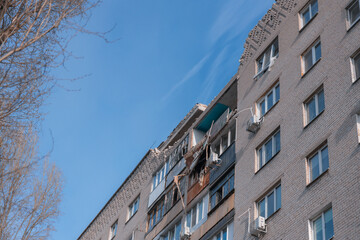 An attack drone (shahed) hit the roof of a house. Rocket attack on a residential building in the city of Dnepr. Consequences after a strong explosion. War in Ukraine and Russia. People under the rubbl