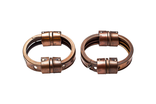 Pair of Metal Rings. Two metal rings are placed side by side. The rings are circular in shape and made of shiny metal, highlighting their smooth texture. The image depicts simplicity and minimalism.