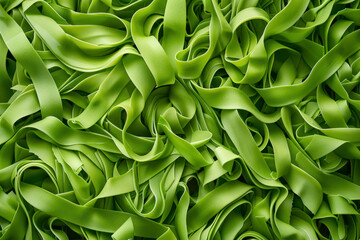 Green spinach tagliatelle pattern background.
