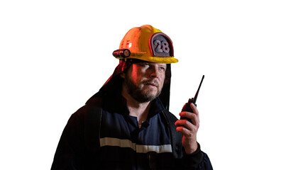 Portrait of a male firefighter holding a walkie-talkie