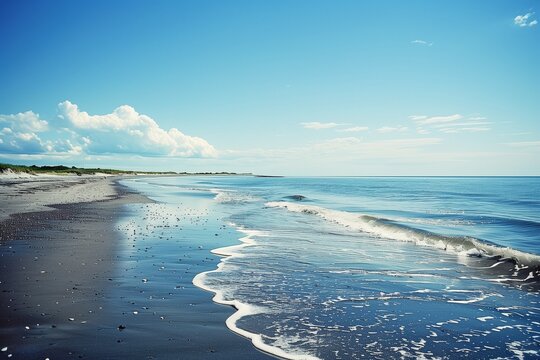 A pristine beach stretches as far as the eye can see, its powdery sand kissed by the gentle caress of the tide.