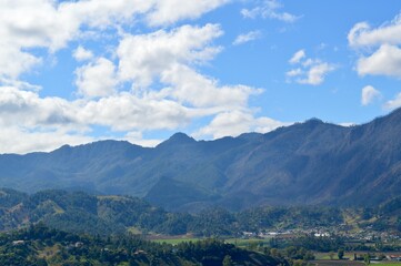 Fototapeta na wymiar mountains and clouds. Dominican Republic