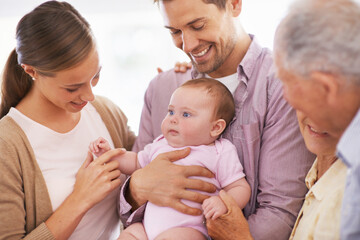 Family, grandparents with baby and parents are happy at home, people bonding with love and...