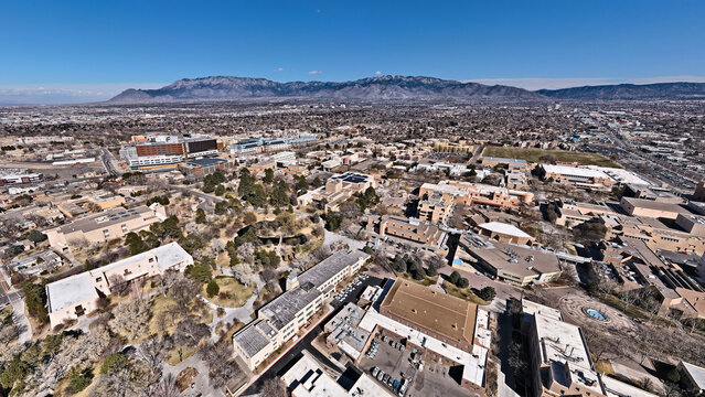 UNM Campus with Sandia mountains from a drone