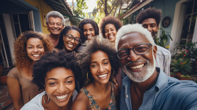Group of happy and smiling colored people taking a selfie