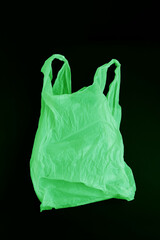 Blank green plastic bag with handles