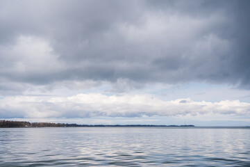Seascape image of the Baltic Sea after a rain shower from the port of Stralsund with a view of...