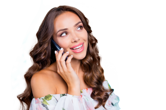 Close up portrait of curly cute dreamy lovely beautiful brunette talk on blue modern smartphone look aside isolated on vivid turquoise background with copy space for text