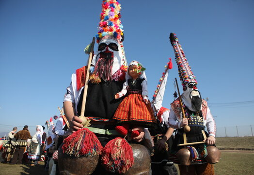 People called Kukeri parade in masks and ritual costumes, perform ritual dances to drive away evil spirits in the town of Elin Pelin, Bulgaria.
