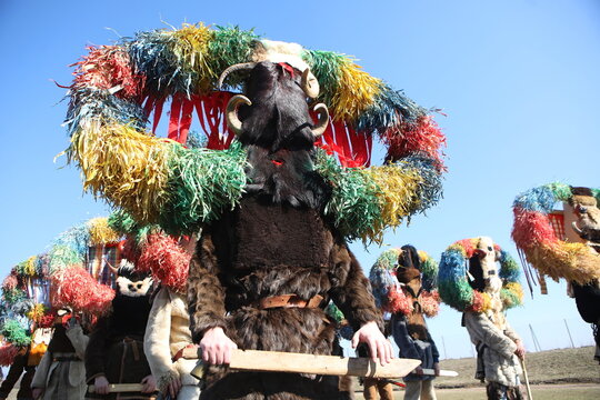 People called Kukeri parade in masks and ritual costumes, perform ritual dances to drive away evil spirits in the town of Elin Pelin, Bulgaria.