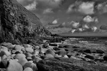 black and white pebble beach
