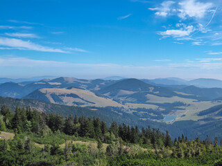 Fototapeta na wymiar On top of majestic mountain peak Hochlantsch with panoramic view of lake at Teichalm, Graz Highlands, Prealps East of the Mur, Styria, Austria. Wanderlust Austrian Alps. Hiking trail in alpine nature