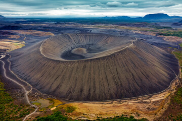Large Hverfjall volcano crater is Tephra cone or Tuff ring volcano on gloomy day in Myvatn area at...