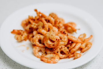 Delicious shrimp and mussels. Seafood on a white plate
