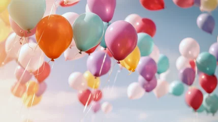 Fotobehang Multi colored balloons on sky background with copy space, Happy Birthday and Party Celebration concept © FutureStock