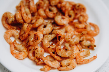 Delicious shrimp and mussels. Seafood on a white plate