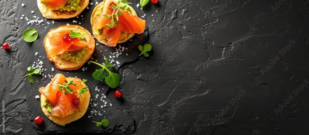 Aufkleber Mini blini pancakes with soft cheese cold smoked salmon and guacamole. with copy space image. Place for adding text or design