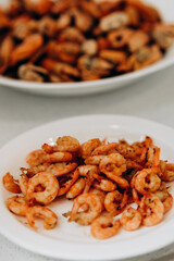 Delicious shrimp and mussels. Seafood on a white plate