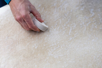 Waxing the board - surf preparation, copy space.