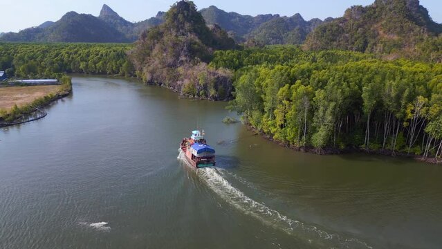 boat mangrove river hills island malaysia. Nice aerial top view flight drone