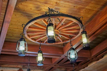 Fotobehang Vintage luxury interior lighting lamp on a ceiling © sanbeliaev
