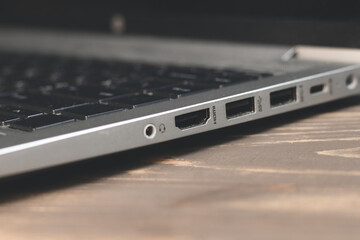 Side panel on a laptop. Different ports for connection.