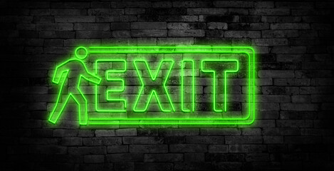 Exit neon sign on brick wall background.