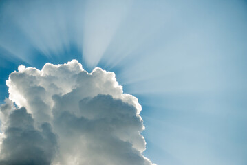 rays of sunlight break through the clouds. rays through the clouds. the sky with clouds and the...