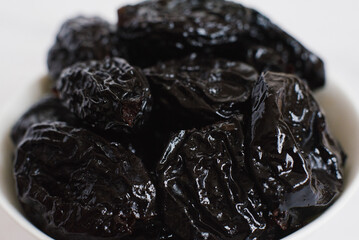 Juicy ripe prunes close-up
