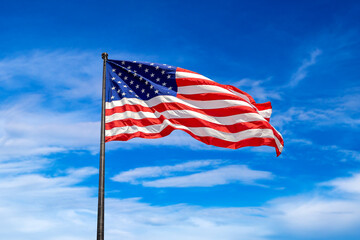 USA flag waving against sky
