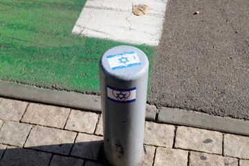 Pillars along the road for the safe passage of pedestrians.