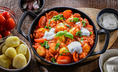 Creamy tomato gnocchi with burrata, basil and garlic