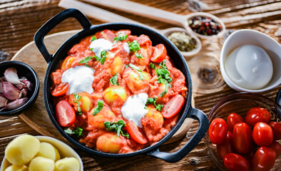 Creamy tomato gnocchi with burrata, basil and garlic