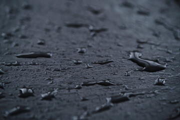 Background, slate wet with drops water board in closeup.